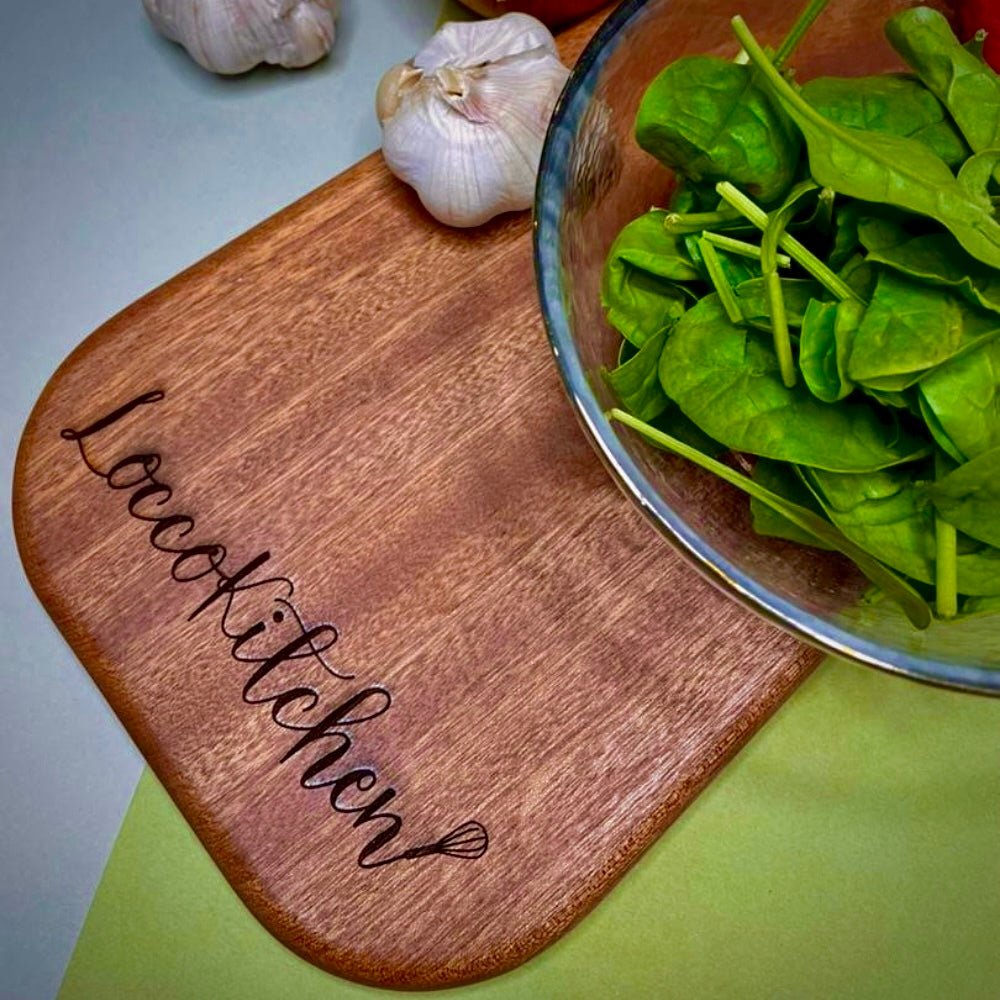 Engraved serving board made from ebony wood with personalized name perfect as wedding gift or housewarming gift