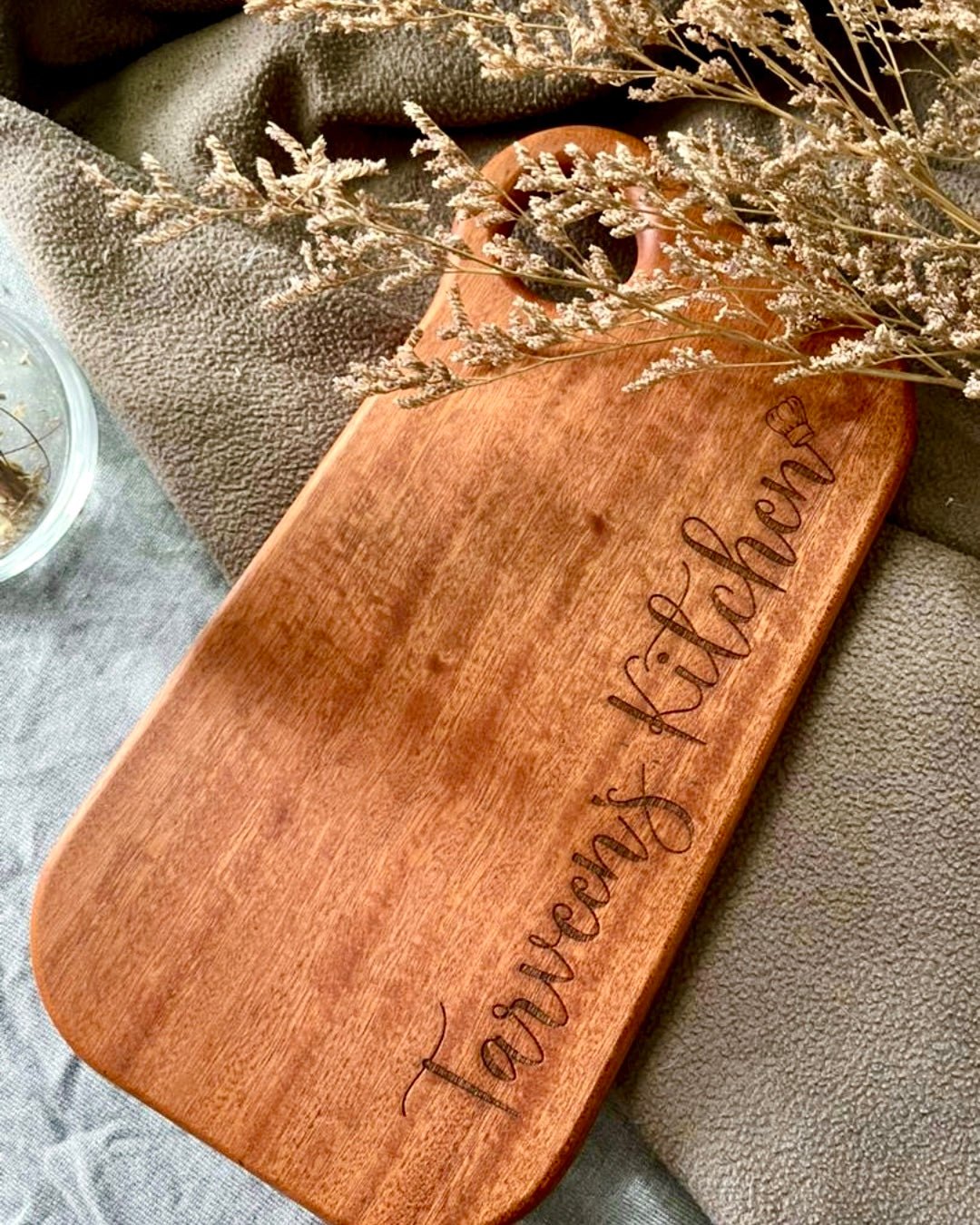 Engraved serving board made from ebony wood with personalized name perfect as wedding gift or housewarming gift